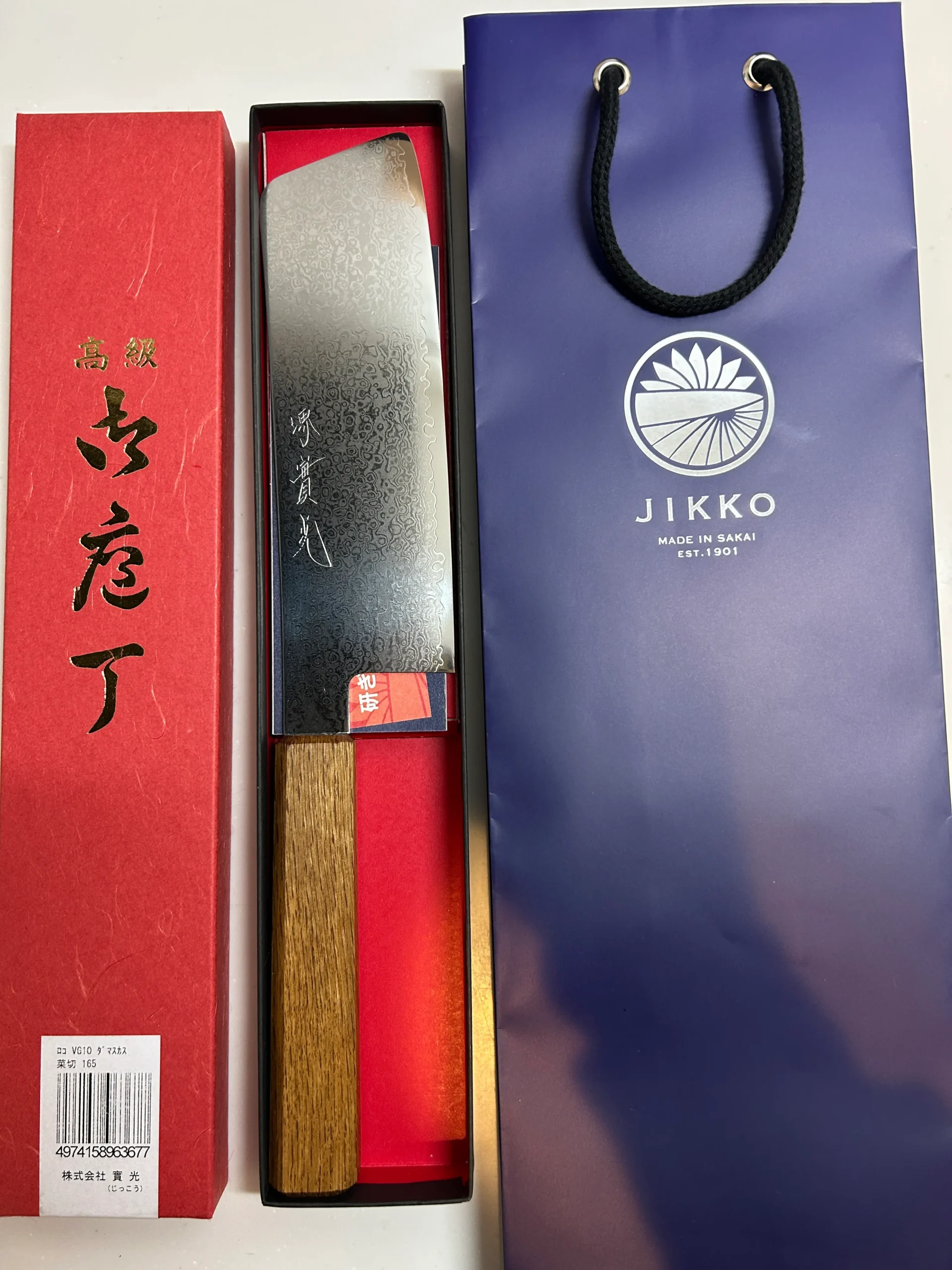 JIKKO Nakiri knife in red premium gift box with JIKKO navy shopping bag